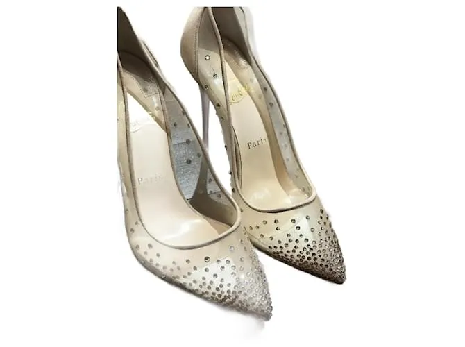 CHRISTIAN LOUBOUTIN Tacones T.UE 39.5 cuero Beige 