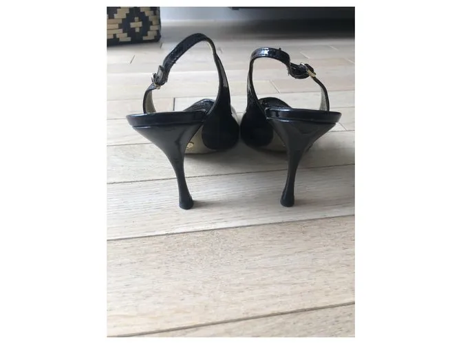 Dolce & Gabbana VERO CUOIO Tacones. Negro Dorado 